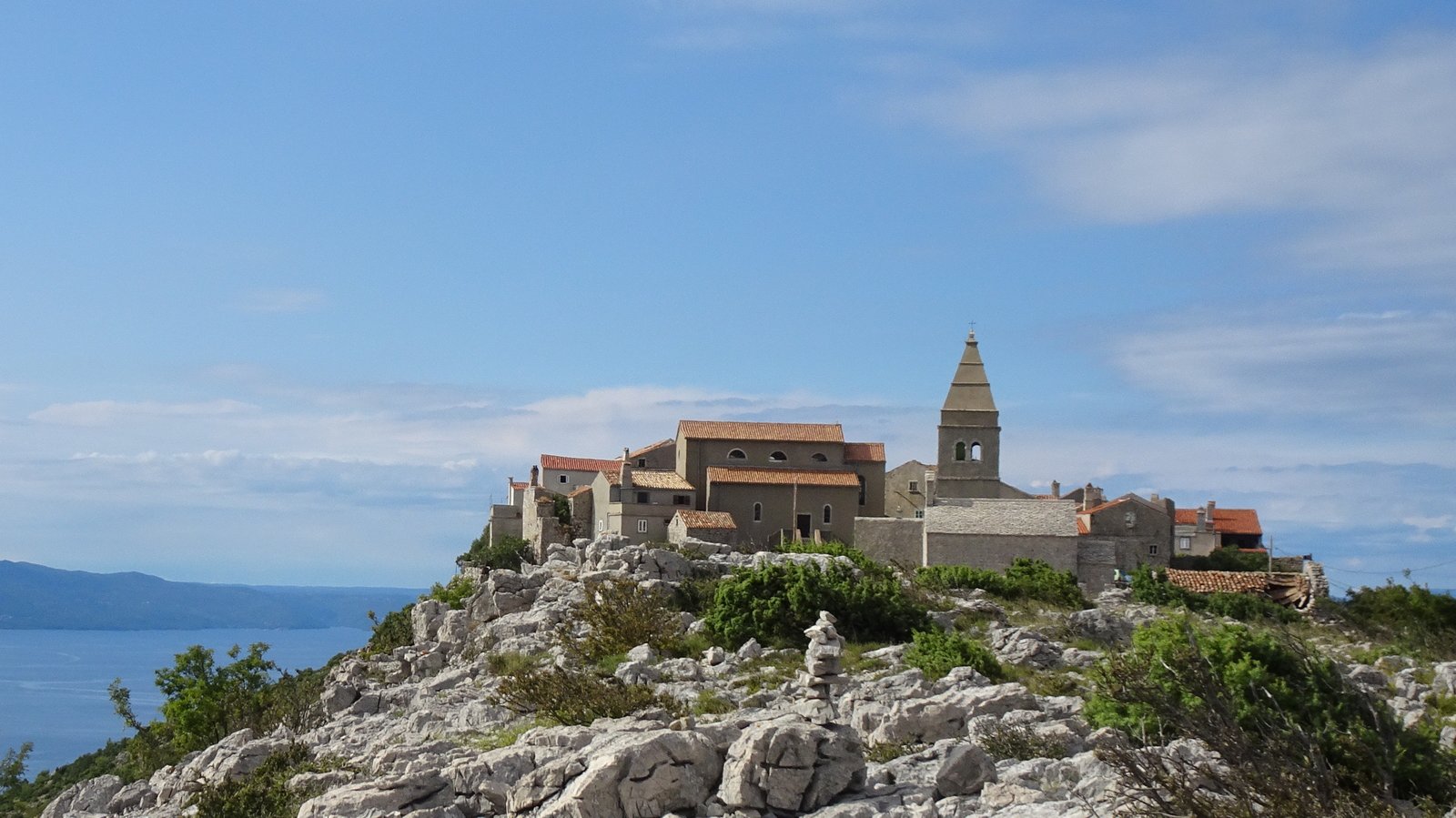 The stone village of Lubenice on its rocky ridge above the Adriatic